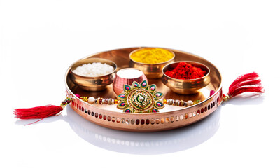 Set of rakhi with kumkum and sweet in thali, raksha bandhan concept
