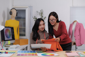 Fashion designers choosing colors for new clothes collection