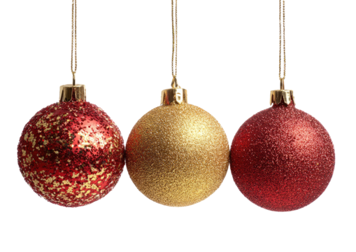 Three Christmas ornaments, red, gold, and red, hanging from strings