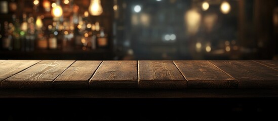 Wooden table top in a dimly lit bar