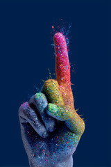 index finger up with a sparkling, rainbow colorful and creative explotion. 3d modeling. dark blue backing