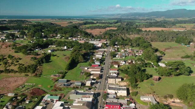 Aerial view ofPoint Arena, California, USA. The photo shows the town's layout, with its main street, houses, and surrounding landscape, highlighting its coastal charm.