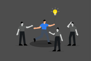 Brighten up business, business manager with light bulb idea to help colleagues in the dark.