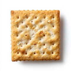 A single cracker on a clean surface, viewed from above, with a square shape and small holes and a delicious crispy look. 
