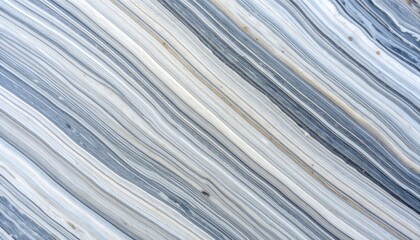Abstract marble-like pattern with diagonal streaks of varying shades of grey, white, and off-white