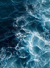 Close-up top view of hyper-realistic ocean water surface with gentle blue and white waves creating detailed fluid texture, capturing the essence of natural movement and clarity in high resolution