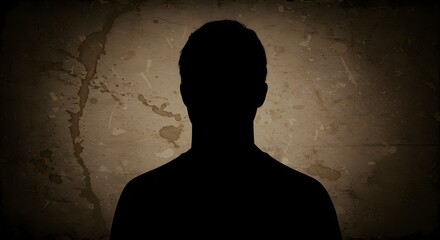 Mysterious silhouette of a person against a textured background