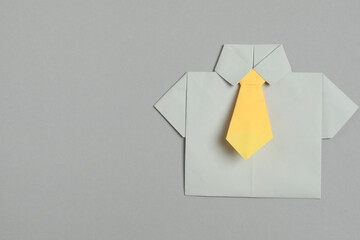 men's paper shirt on a gray background
