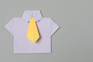 paper people on a gray background
