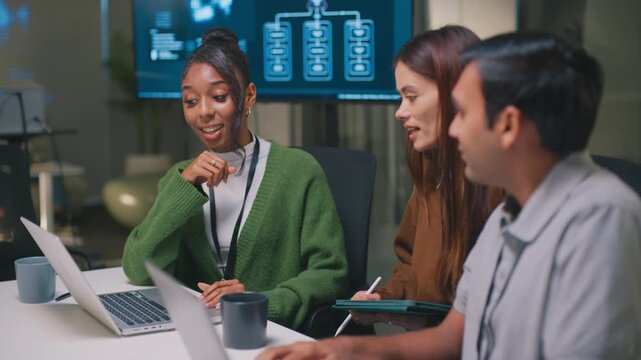 Business team collaboration for an ai and machine learning presentation. Focused software development in modern office, showcasing innovative technology concepts