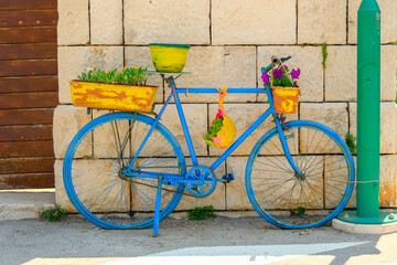 Colorful bike on street in Pucisca town.The island of Brac. Croatia