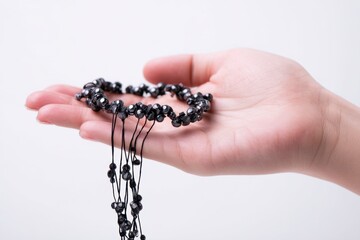 Black Beaded Bracelet on Hand