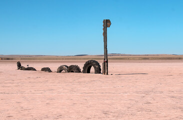 Loch-Eel Monster sculpture made from tires in the middle of dry Lake Bumbunga, South Australia