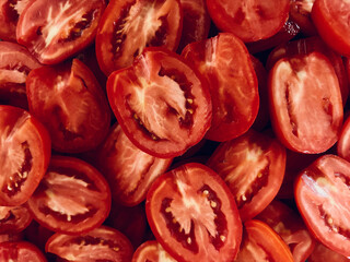 Pile of Sliced Fresh Tomatoes as a Food Background