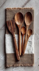 Wooden Utensil Set on Burlap and Marble. High quality