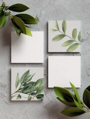 White Square Stickers Mockup with Green Leaves on Textured Background. High quality