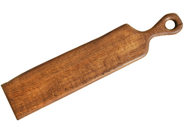 Wooden kitchen tool used for chopping vegetables or preparing food in a home setting