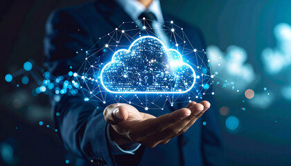 A businessman holds a glowing cloud icon, symbolizing cloud computing and digital security in a futuristic setting
