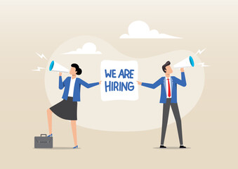 A businesswoman and a businessman, both holding megaphones