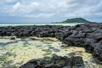 Volcanic Shoreline and Clear Shallow Waters in Jeju Island, South Korea