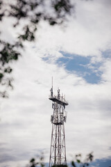 Metal cell tower with antennas and equipment - mobile phone base station