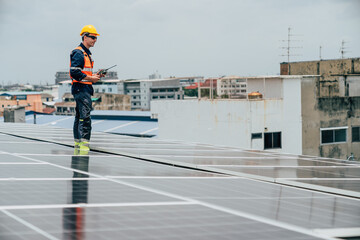 Solar panel technician conducts maintenance on rooftop system in urban setting during cloudy weather
