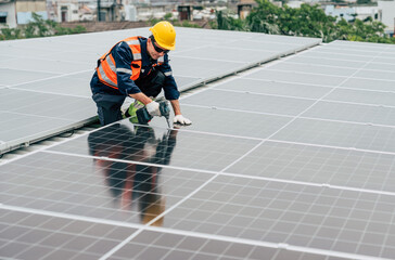 Rooftop solar panel installation in bright daylight at urban setting with technician working carefully