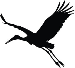 Silhouette of crane bird in flight