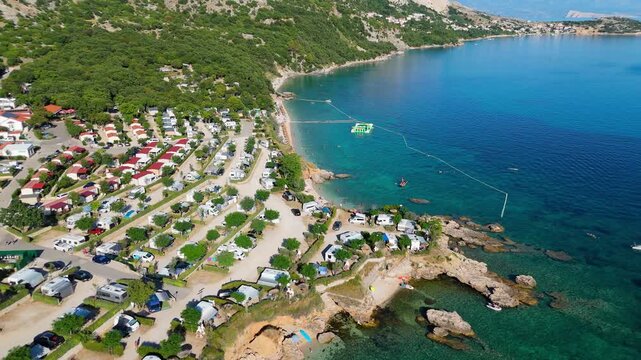 Campsite at Campig Skrila, Krk Island, Stara Baska Croatia, Aerial View of the Mountains and Coast With Boats, Beaches and Adriatic Sea. The Seaside Rv Campmobiles on a Summer Beautiful Coastline