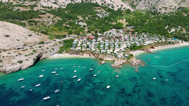Campsite at Campig Skrila, Krk Island, Stara Baska Croatia, Aerial View of the Mountains and Coast With Boats, Beaches and Adriatic Sea. The Seaside Rv Campmobiles on a Summer Beautiful Coastline