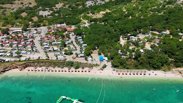 Campsite at Campig Skrila, Krk Island, Stara Baska Croatia, Aerial View of the Mountains and Coast With Boats, Beaches and Adriatic Sea. The Seaside Rv Campmobiles on a Summer Beautiful Coastline