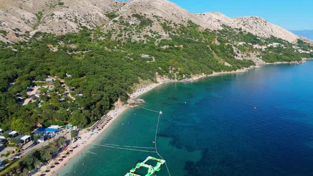 Campsite at Campig Skrila, Krk Island, Stara Baska Croatia, Aerial View of the Mountains and Coast With Boats, Beaches and Adriatic Sea. The Seaside Rv Campmobiles on a Summer Beautiful Coastline