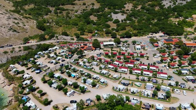 Campsite at Campig Skrila, Krk Island, Stara Baska Croatia, Aerial View of the Mountains and Coast With Boats, Beaches and Adriatic Sea. The Seaside Rv Campmobiles on a Summer Beautiful Coastline
