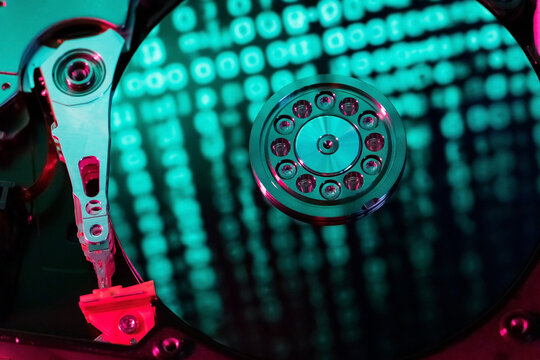 A hard disk with a blue binary code
