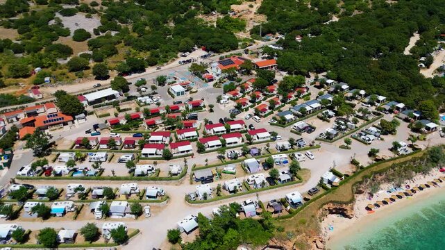 Campsite at Campig Skrila, Krk Island, Stara Baska Croatia, Aerial View of the Mountains and Coast With Boats, Beaches and Adriatic Sea. The Seaside Rv Campmobiles on a Summer Beautiful Coastline