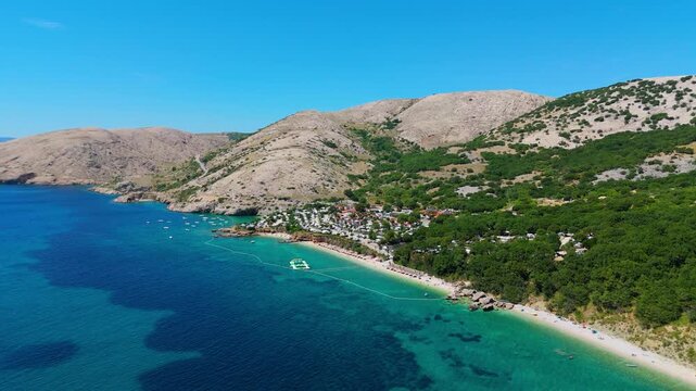 Campsite at Campig Skrila, Krk Island, Stara Baska Croatia, Aerial View of the Mountains and Coast With Boats, Beaches and Adriatic Sea. The Seaside Rv Campmobiles on a Summer Beautiful Coastline