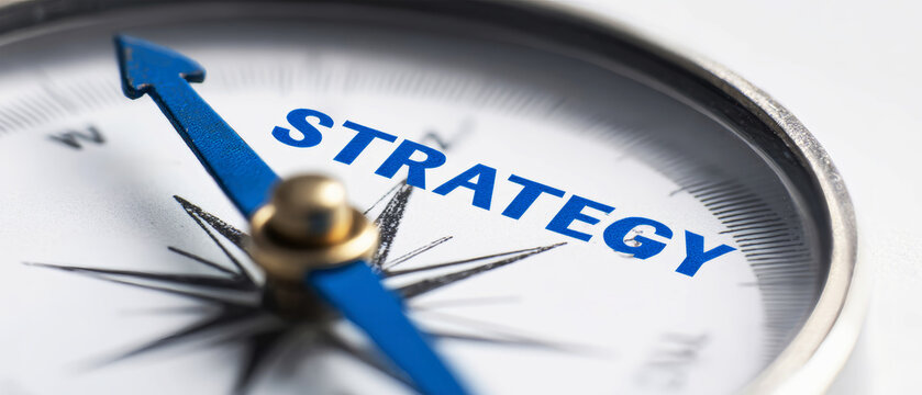 Elegant compass guiding towards the word strategy in a minimalist setting with blue accents and a sleek design