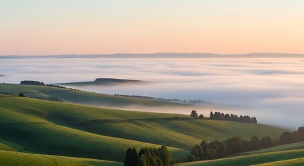 Rolling green hills covered in morning mist under a soft pastel sky