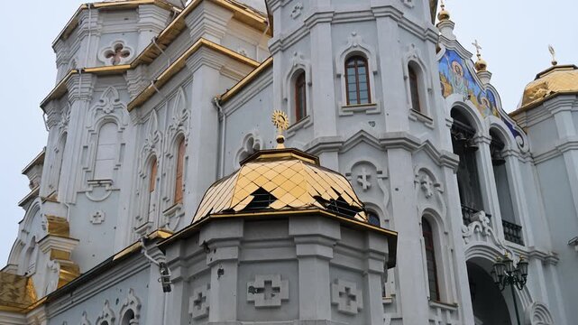 Evidence of shelling on a cultural site in Kharkiv, Ukraine. The Holy Myrrh-Bearing Women Church shows extensive shrapnel damage, a result of attacks on civilian areas.