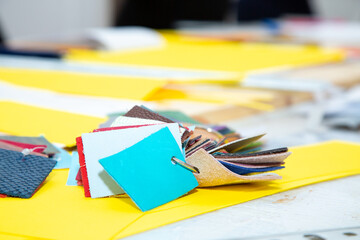 A variety of different colored squares are placed on a table