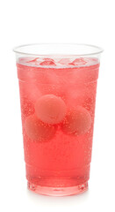 A pink lychee sparkling tea served in a transparent plastic cup with no branding. The image is isolated on a clean white background. 