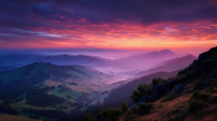 Obraz premium Majestic sunrise over rolling hills and valleys showcasing vibrant colors in the early morning sky