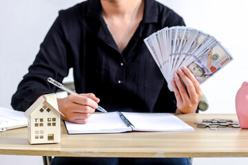 Financial Planning Scene With Hands Managing Money And Documents