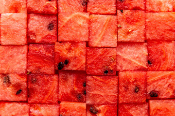 pattern, texture of watermelon cubes, summer vibe, red colour, edible art, many watermelon cubes put together to pattern