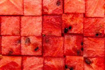 pattern, texture of watermelon cubes, summer vibe, red colour, edible art, many watermelon cubes...