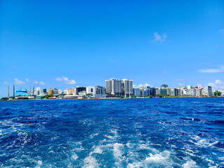 Hulhulé, Maldives - 12 April 2025: Malé cityscape stretches along the horizon, showcasing...