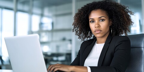 Concerned Professional African American Woman Posing in Bright Office, Serious Expression on Face