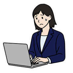 困った表情の女性　パソコン作業中