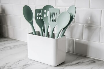 Eco kitchen utensils set in a ceramic holder on a marble countertop, daylight, minimalist kitchen decor