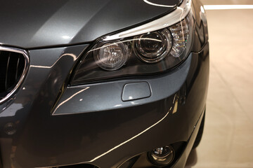 RED Sport coupe car on dark background.